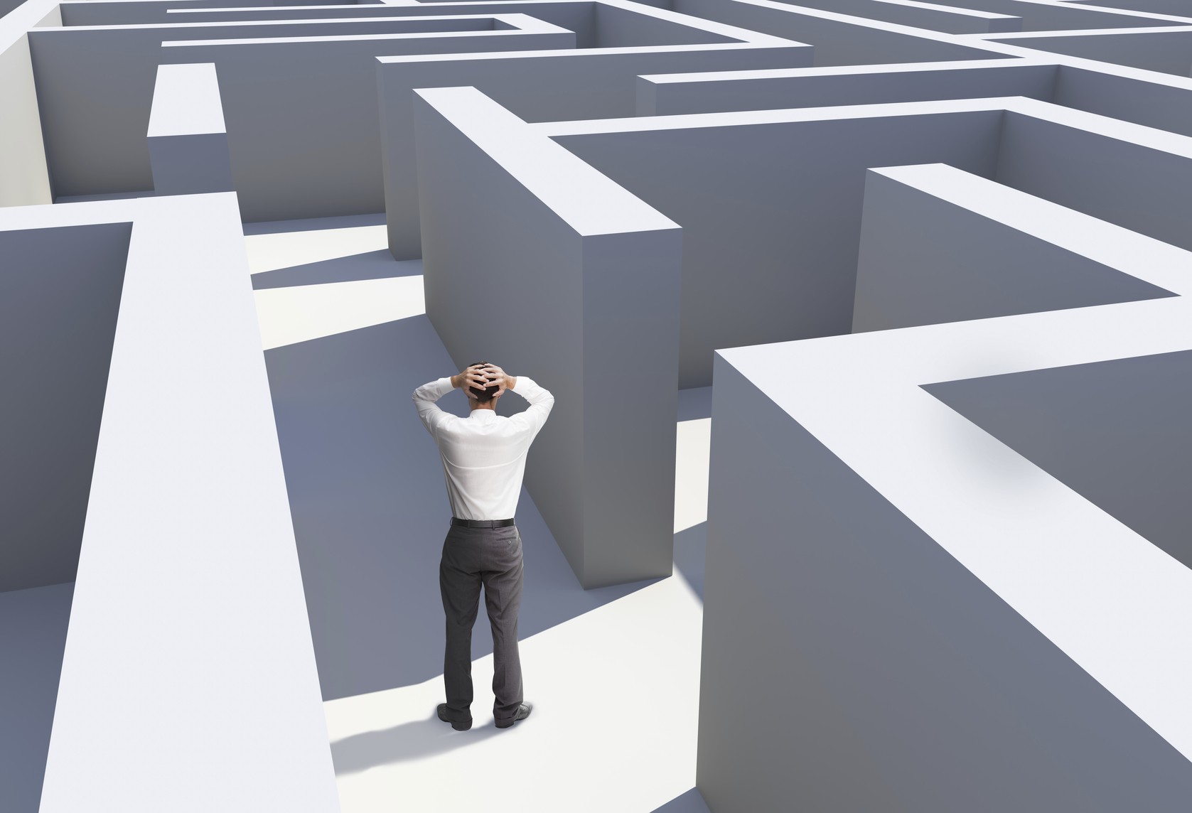 Frustrated man lost in a maze