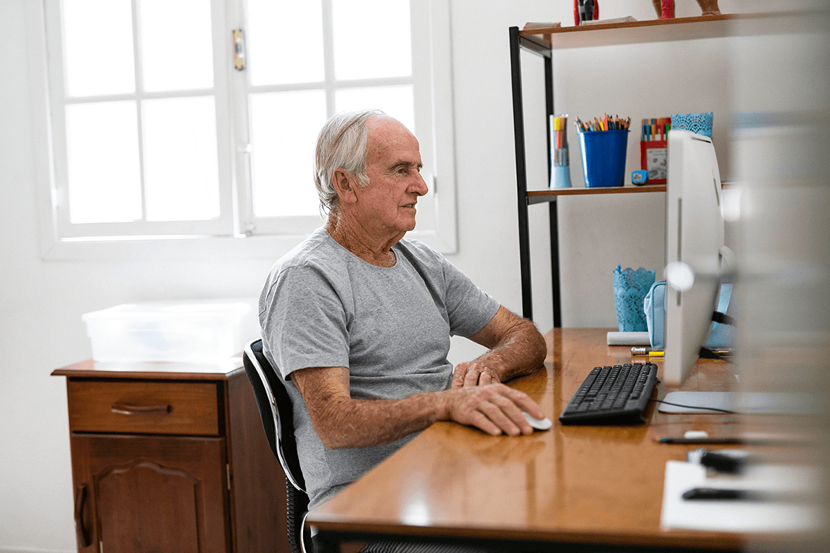 Older gentleman using computer