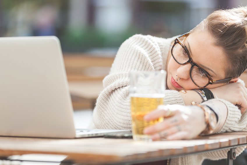 Woman patiently waits during laptop loading time