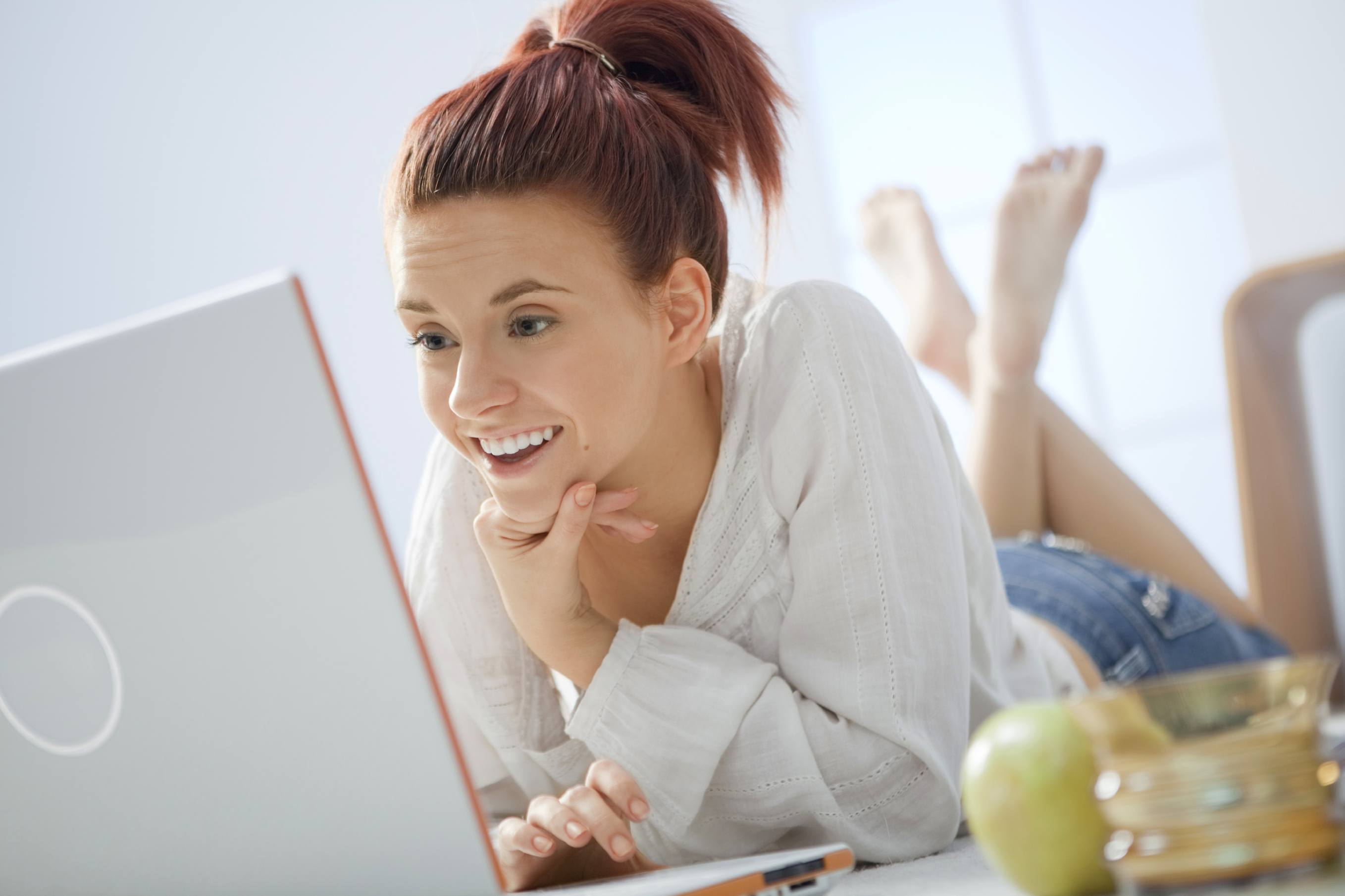 Woman reading interesting online article - iStock copyright Bartosz Durczewski